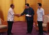 Photograph of the Prime Minister shaking hands with the Governor of Okinawa Prefecture, Mr. Hirokazu Nakaima, after receiving the Plan for the Promotion and Development of Okinawa