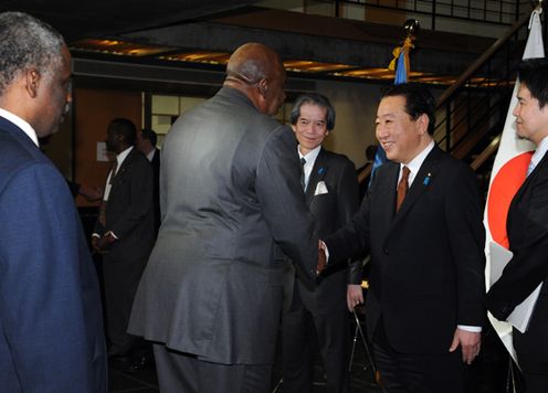 Photograph of the Prime Minister welcoming invited guests at the welcome reception he hosted