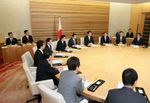 Photograph of the Prime Minister attending the Cabinet meeting 1