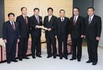 Photograph of the Prime Minister receiving a greeting from the representatives of the six regional organizations 1