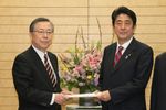 Photograph of Prime Minister Abe receiving a courtesy call from the Governor of Fukushima Prefecture, Mr. Yuhei Sato 1