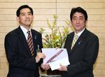 Photograph of Prime Minister Abe receiving a courtesy call from the Mayor of Obama City, Mr. Koji Matsuzaki 1