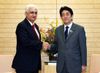 Photograph of Prime Minister Abe shaking hands with the External Affairs Minister of India, Mr. Salman Khurshid