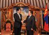 Photograph of Prime Minister Abe shaking hands with the President of Mongolia, Mr. Tsakhia Elbegdorj