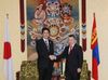 Photograph of Prime Minister Abe shaking hands with the Chairman of the State Great Hural of Mongolia, Mr. Zandaakhuu Enkhbold