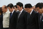 Photograph of the Prime Minister offering a silent prayer at the commemorative ceremony for the war dead