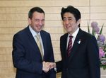 Photograph of Prime Minister Abe shaking hands with the President of the ICRC, Mr. Peter Maurer