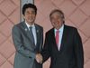 Photograph of Prime Minister Abe shaking hands with UN High Commissioner for Refugees António Guterres