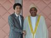 Photograph of Prime Minister Abe shaking hands with President of the Union of Comoros Ikililou Dhoinine