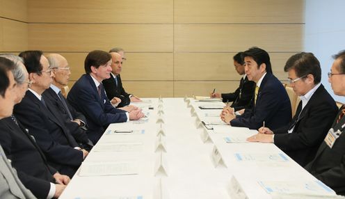 Photograph of the Prime Minister receiving an explanation of the report