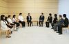 Photograph of Prime Minister Abe receiving a courtesy call from the President of Ashinaga, Mr. Yoshiomi Tamai, recipients of Ashinaga scholarships, and others (2)