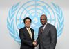 Photograph of Prime Minister Abe shaking hands with President Ashe of the United Nations General Assembly