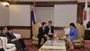 Photograph of the Prime Minister attending a meeting with Ms. Yingluck Shinawatra, Prime Minister of the Kingdom of Thailand