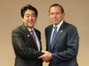 Photograph of Prime Minister Abe shaking hands with Mr. Tony Abbott, Prime Minister of Australia