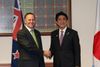 Photograph of Prime Minister Abe shaking hands with Mr. John Key, Prime Minister of New Zealand