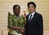 Photograph of Prime Minister Abe shaking hands with Rt. Hon. Rebecca Alitwala Kadaga, Speaker of Parliament of the Republic of Uganda