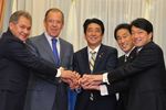 Photograph of Prime Minister Abe shaking hands with the Hon. Lavrov, Sergey Viktorovich, Minister of Foreign Affairs of the Russian Federation; and the Hon. Shoigu, Sergey Kuzhugetovich, Minister of Defense of the Russian Federation