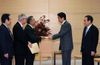 Photograph of Prime Minister Abe receiving the proposal from Mr. Tadamori Oshima, Chairman of the LDP Headquarters for Accelerating Reconstruction after the Great East Japan Earthquake (2)