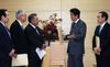 Photograph of Prime Minister Abe receiving the proposal from Mr. Tadamori Oshima, Chairman of the LDP Headquarters for Accelerating Reconstruction after the Great East Japan Earthquake (3)