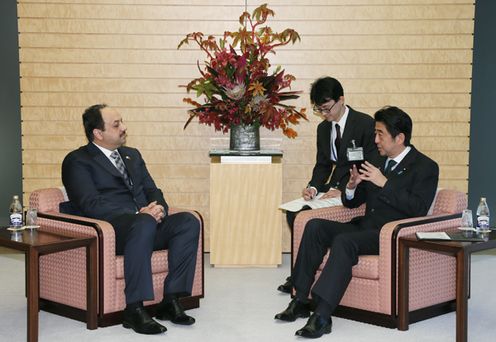 Photograph of Prime Minister Abe receiving a courtesy call from H.E. Dr. Khalid bin Mohamed Al-Attiyah, Foreign Minister of the State of Qatar