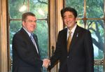 Photograph of Prime Minister Abe shaking hands with Mr. Thomas Bach, President of the International Olympic Committee (IOC)