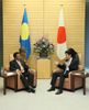 Photograph of Prime Minister Abe receiving a courtesy call from H.E. Mr. Tommy E. Remengesau Jr., President of the Republic of Palau (2)