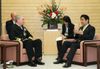 Photograph of Prime Minister Abe receiving a courtesy call from Commander Miller