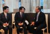 Photograph of Prime Minister Abe conversing with the Hon. Mr. Tony Abbott, Prime Minister of Australia