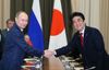 Photograph of Prime Minister Abe shaking hands with H.E. Mr. Vladimir Vladimirovich Putin, President of the Russian Federation, at the Japan-Russia Summit Meeting