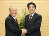 Photograph of Prime Minister Abe shaking hands with Mr. Yoichi Masuzoe, Governor of the Tokyo Metropolitan Government