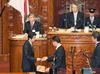 Photograph of the Prime Minister casting his ballot at the plenary session of the House of Representatives