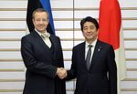 Photograph of Prime Minister Abe shaking hands with H.E. Mr. Toomas Hendrik Ilves, President of the Republic of Estonia