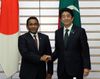 Photograph of Prime Minister Abe shaking hands with H.E. Mr. Abdulla Yameen Abdul Gayoom, President of the Republic of Maldives