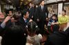 Photograph of the Prime Minister conversing with passengers in a railcar of the Sanriku Railway (3)