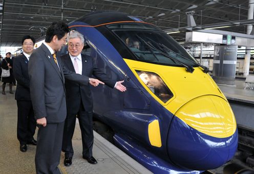 Photograph of the Prime Minister taking a test ride on the Hitachi Javelin train