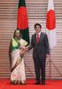 Photograph of Prime Minister Abe welcoming H.E. Sheikh Hasina, Prime Minister of the People's Republic of Bangladesh (2)