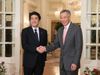 Photograph of Prime Minister Abe shaking hands with H.E. Mr. Lee Hsien Loong, Prime Minister of the Republic of Singapore