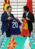 Photograph of the leaders exchanging the national football team uniforms of their respective countries (1)