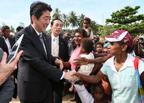 Photograph of the Prime Minister being welcomed in Wewak