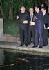 Photograph of both leaders feeding the koi carp in the pond at the Kyoto State Guest House