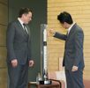 Photograph of the Prime Minister receiving an explanation of a model of the rocket (1)