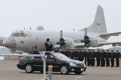 Photograph of the Prime Minister reviewing units