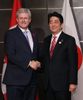 Photograph of Prime Minister Abe shaking hands with the Prime Minister of Canada