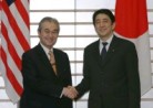 Photograph of Prime Minister Abe shaking hands with Prime Minister Abdullah