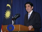 Photograph of the Prime Minister holding a press conference on his tour to Indonesia, India and Malaysia