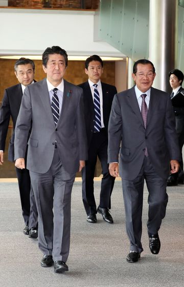 Photograph of the leaders heading to the signing ceremony