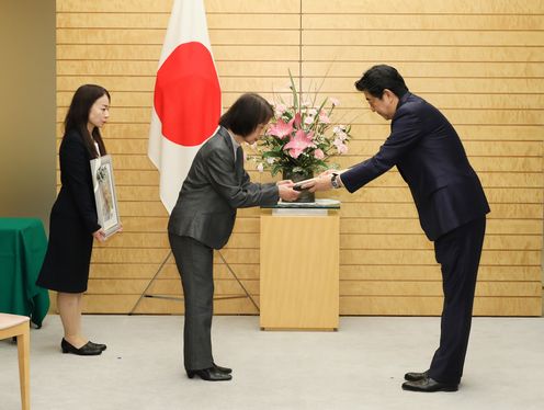 Photograph of the Prime Minister conferring a decoration