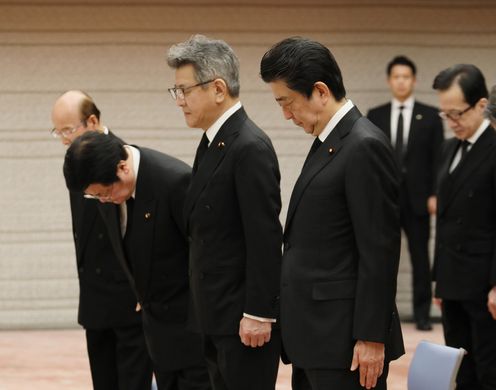 Photograph of the Prime Minister observing a moment of silence (1)