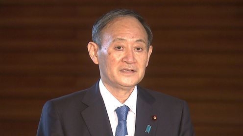 Photograph of the Prime Minister holding the press conference