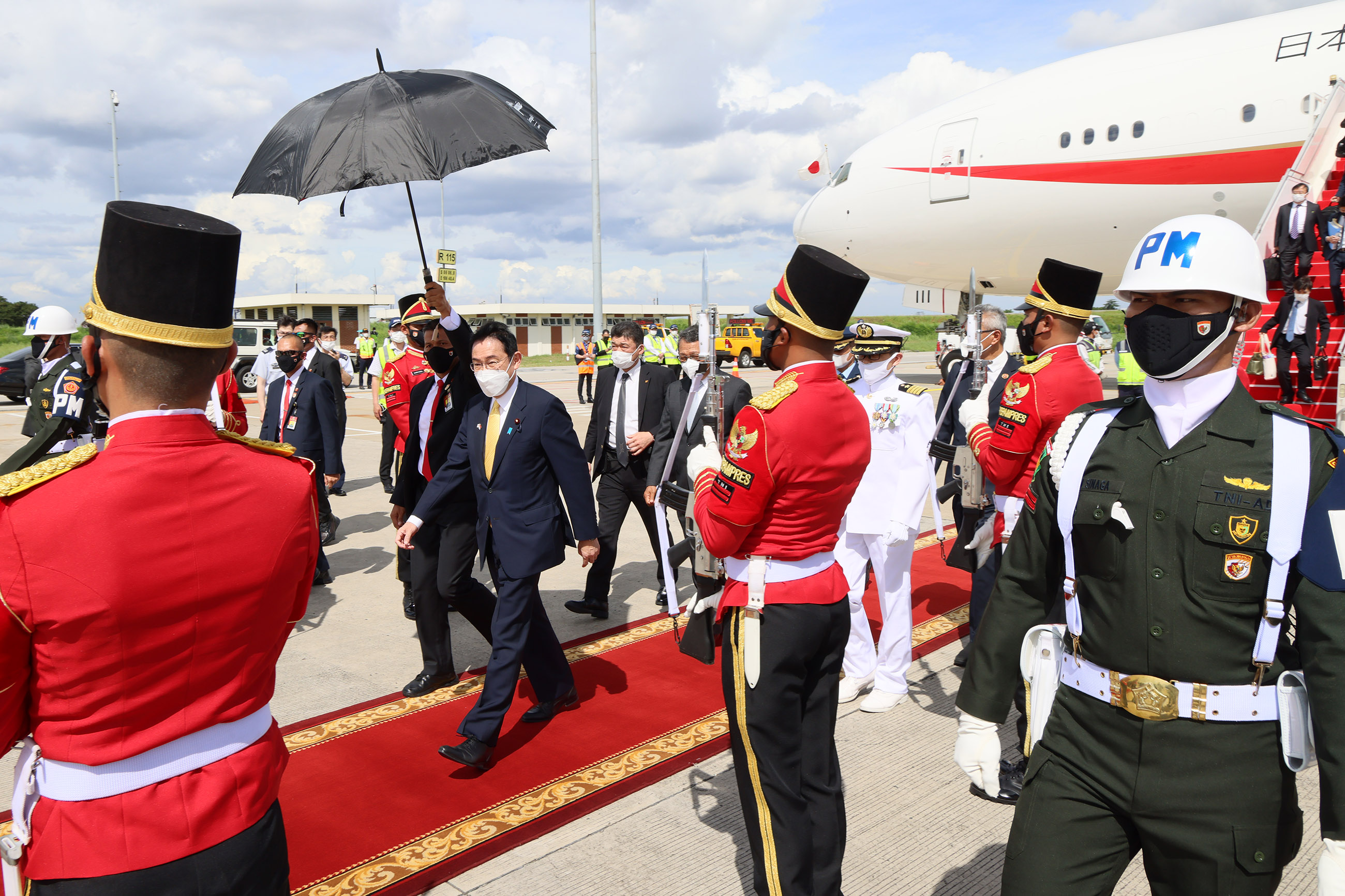 Photograph of the Prime Minister arriving in Indonesia